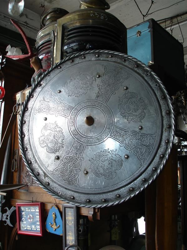 Escudos con espadas